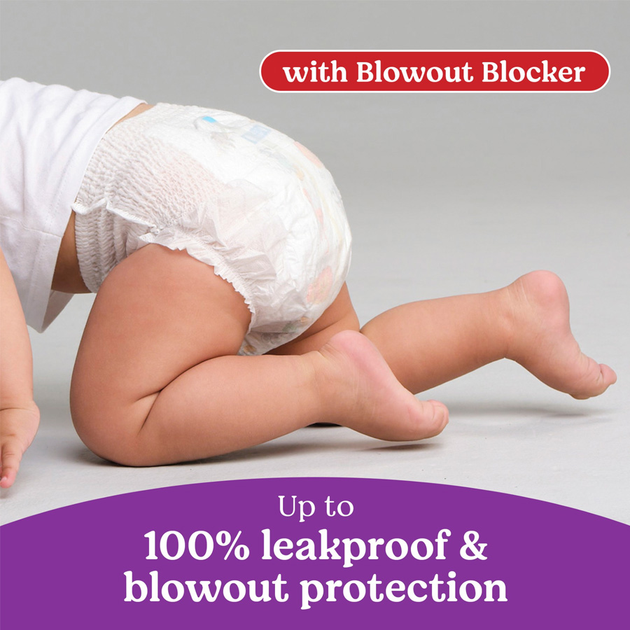 Small child crawling wearing Little Movers® HuggFit™ 360° Diapers proving the all-around Blowout Blocker and Leakproof protection